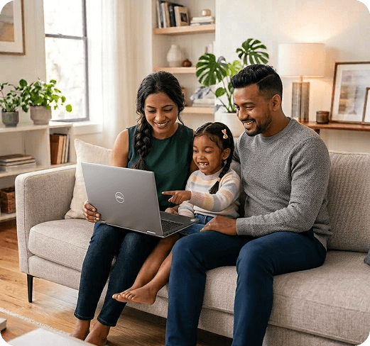A family reviewing their loan options together on a laptop